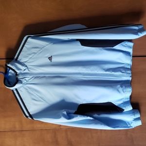 Baby blue and black Adidas nylon zip up jacket.
